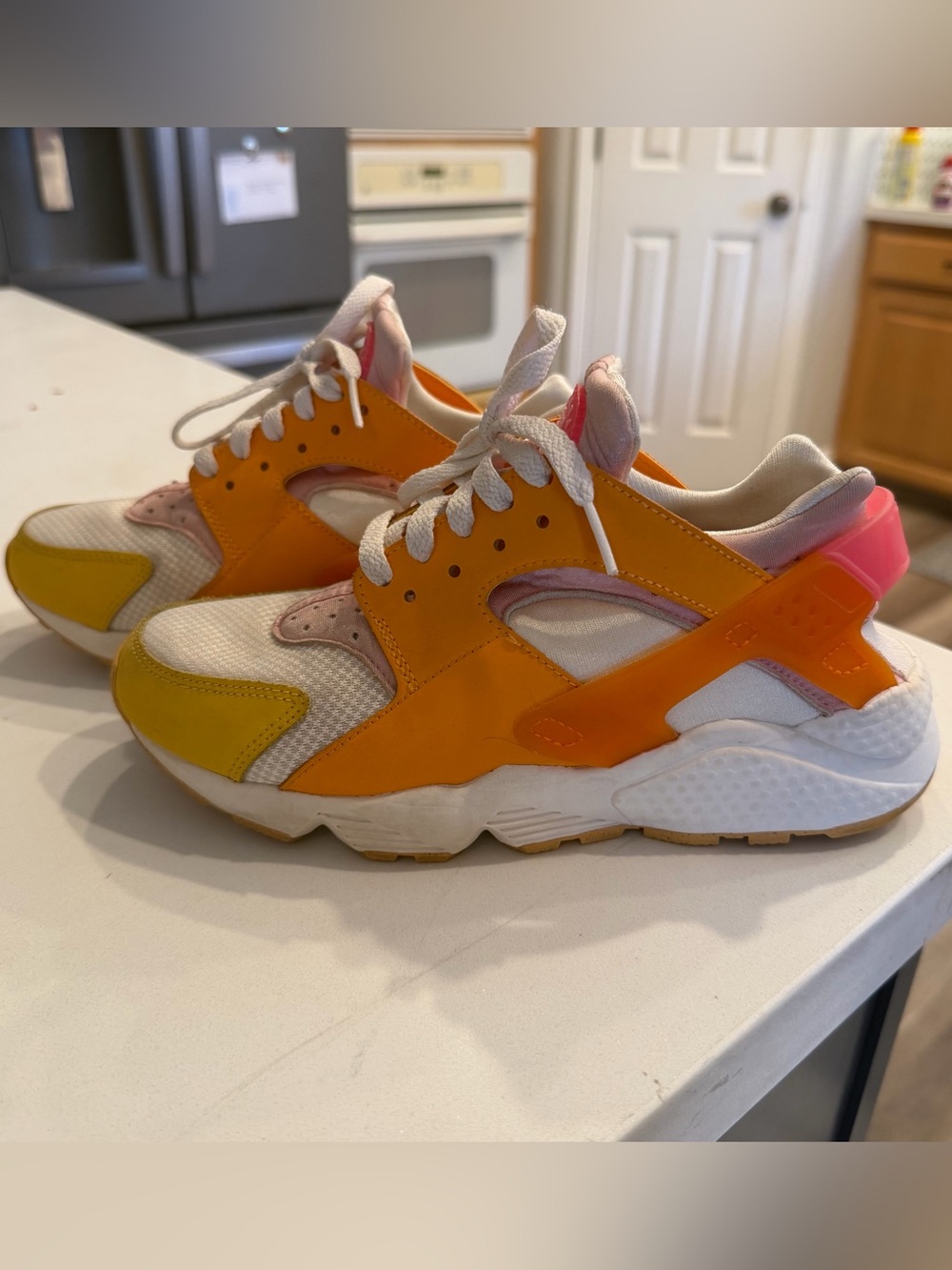 Nike Women’s Orange, Pink and Yellow Huraches shoes size 8